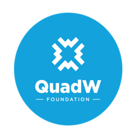A blue circle with a white geometric symbol at the top and the words QuadW Foundation in white text below the symbol.